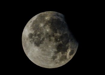 Rare partial lunar eclipse of harvest supermoon delights UK stargazers | Science & Tech News