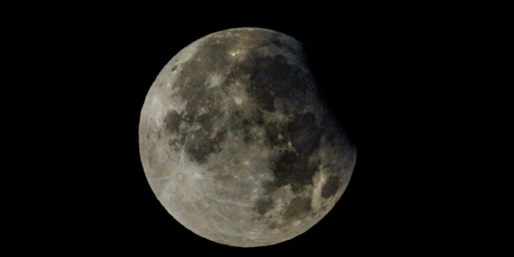 Rare partial lunar eclipse of harvest supermoon delights UK stargazers | Science & Tech News