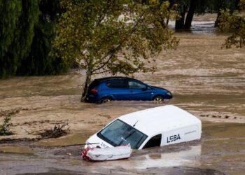 Several missing as flash floods sweep cars through the streets in Spain | World News